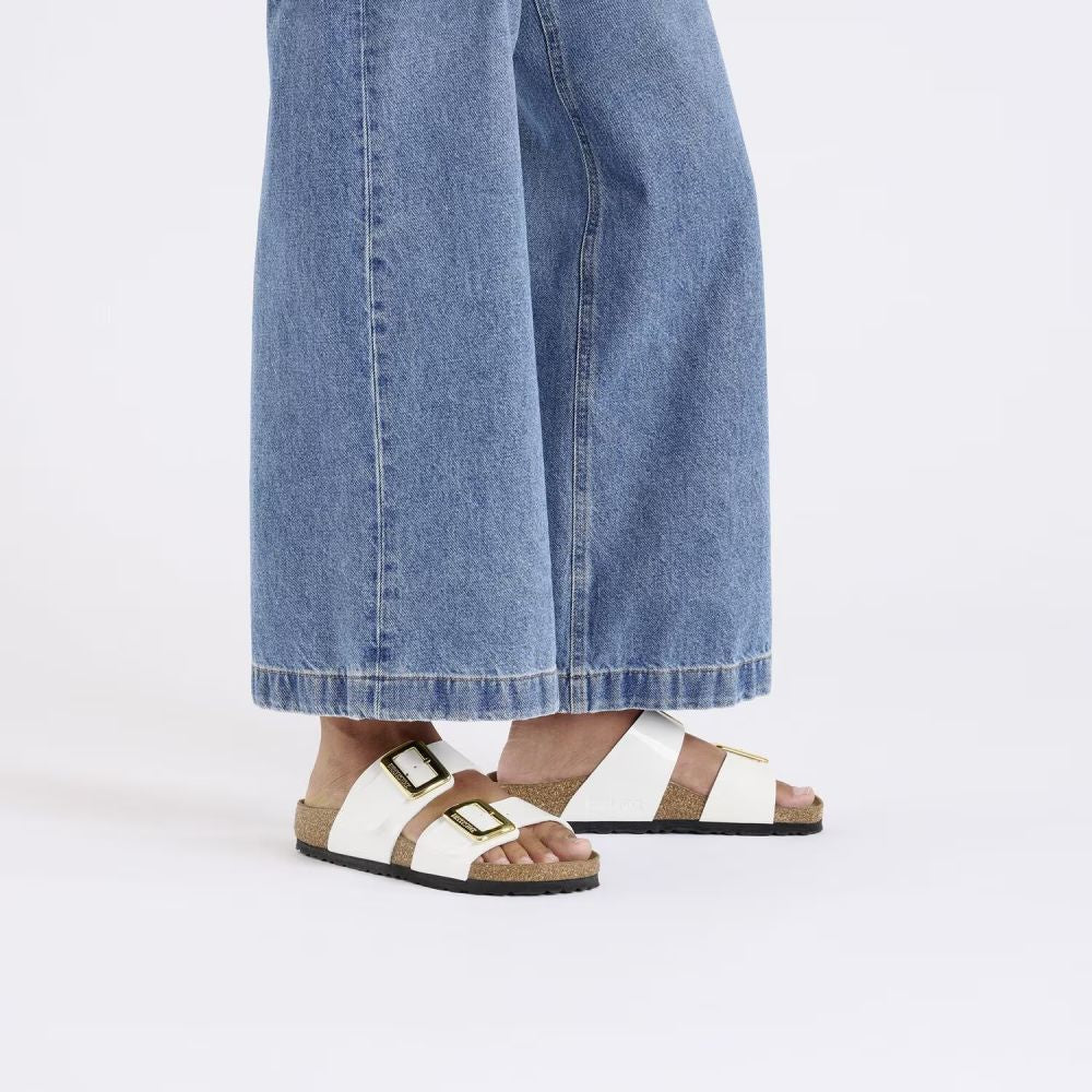 Birkenstock Women's Sydney Luxe Buckle Birko-Flor in Patent White (Narrow Width)